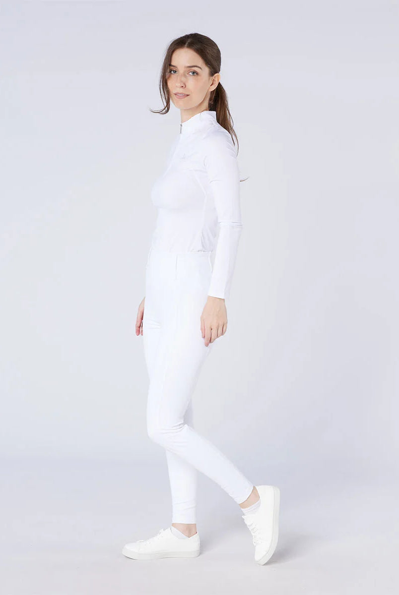 CAMEO All Season Tights in White worn by a rider for British equestrian competition featuring a high-rise core-supporting waistband and 4-way compression stretch. These technical show tights include an innovative full-seat silicone chevron grip and thermal brushed lining for professional performance.