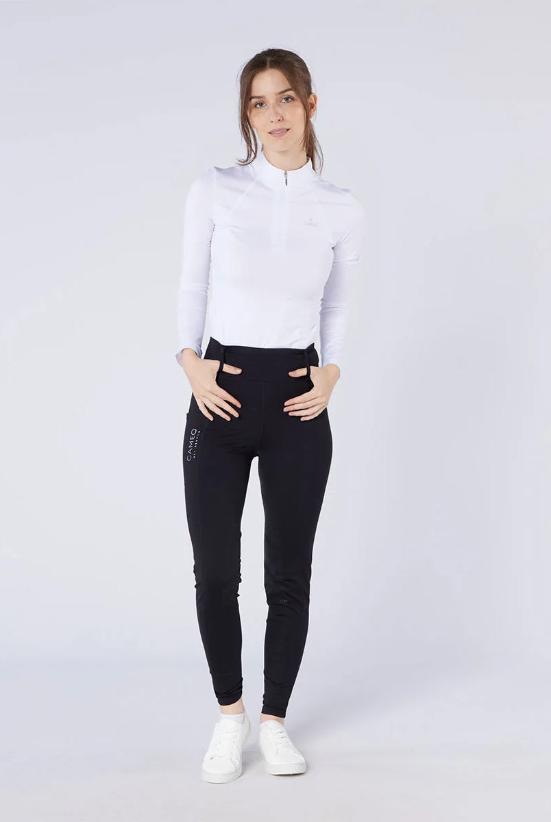 CAMEO All Season Tights in Black featuring a high-rise core-supporting waistband and technical 4-way compression stretch. These premium equestrian riding tights include a full-seat chevron silicone grip for in-saddle stability and a thermal brushed fleece lining for all-weather training in the UK.