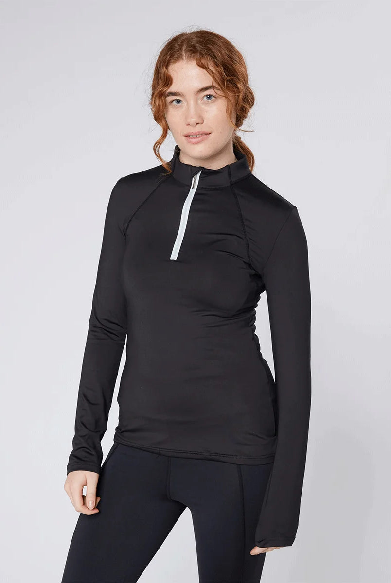 CAMEO Core Collection Baselayer in Black featuring a contrast white quarter-zip and technical 4-way stretch CameoTech fabric. This professional equestrian top is designed with a tailored silhouette, ergonomic flat-lock seams, and active moisture-wicking properties for high-performance riding in the UK.