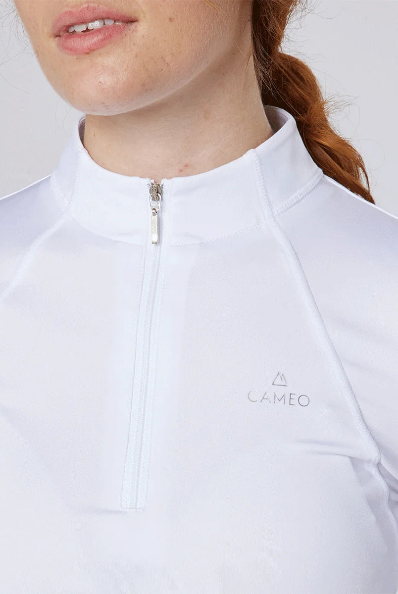 CAMEO Core Collection Baselayer in White showing a close-up of the reflective silver branding and ergonomic quarter-zip stand collar. This competition-ready equestrian top features technical CameoTech 4-way stretch fabric and anti-chafing flat-lock seams for maximum comfort during show days.