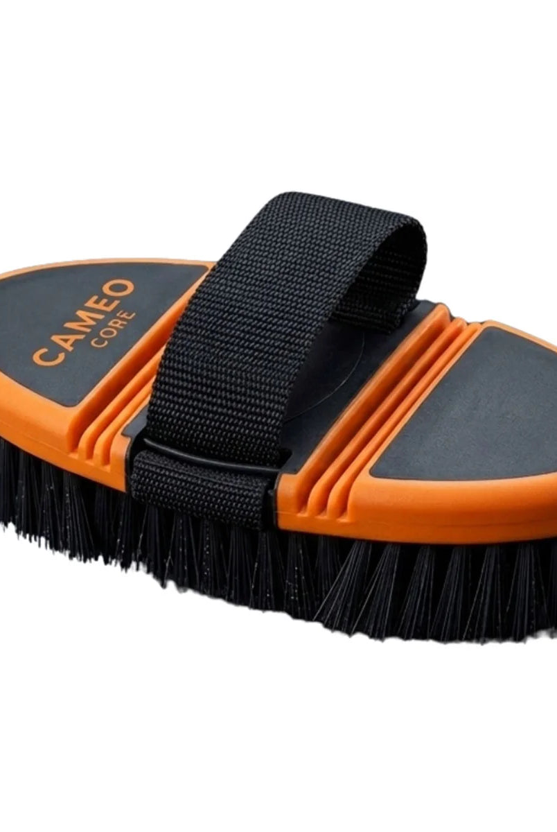 CAMEO Flexi Grooming Brush in Orange featuring an elasticated hand strap and dense bristles for thorough equine coat cleaning.