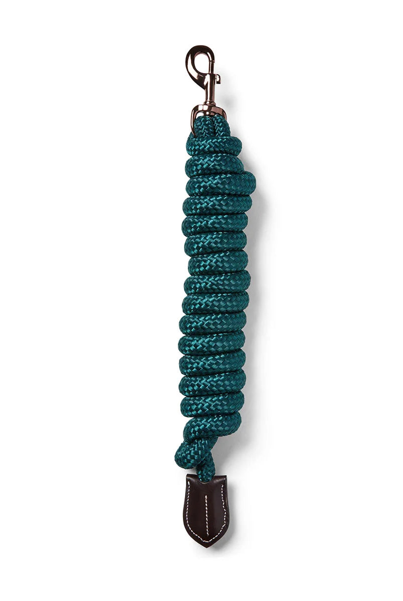 CAMEO Performance Lasso Rope in EverGreen shown coiled on a white background, showcasing the 16mm multi-filament braided yachting rope, Cacao bronze swivel trigger snap, and stitched leather popper engineered for burn-free grip, youngstock education, and natural horsemanship groundwork control.