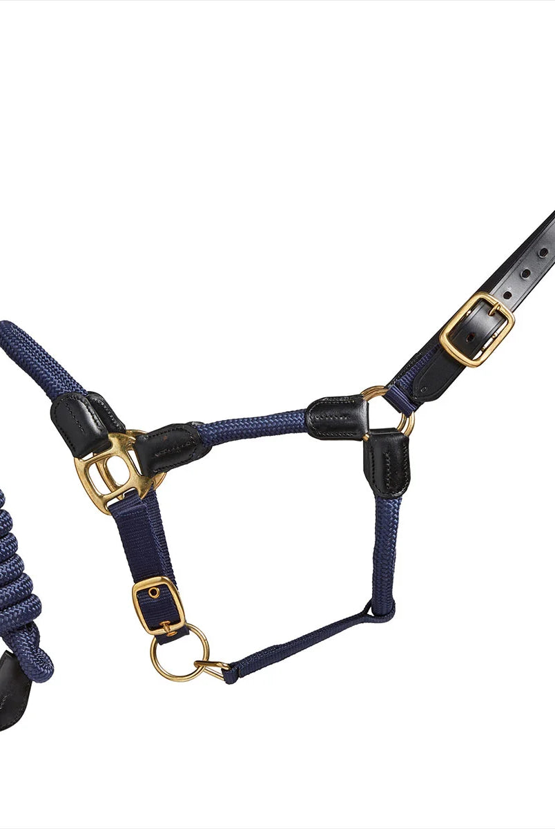 CAMEO Rope Leather Headcollar and Leadrope in Navy showcasing braided yachting rope, black leather poll strap, and solid brass fittings, complete with a matching coiled leadrope and trigger clip for sensitive groundwork control and stableyard travel.