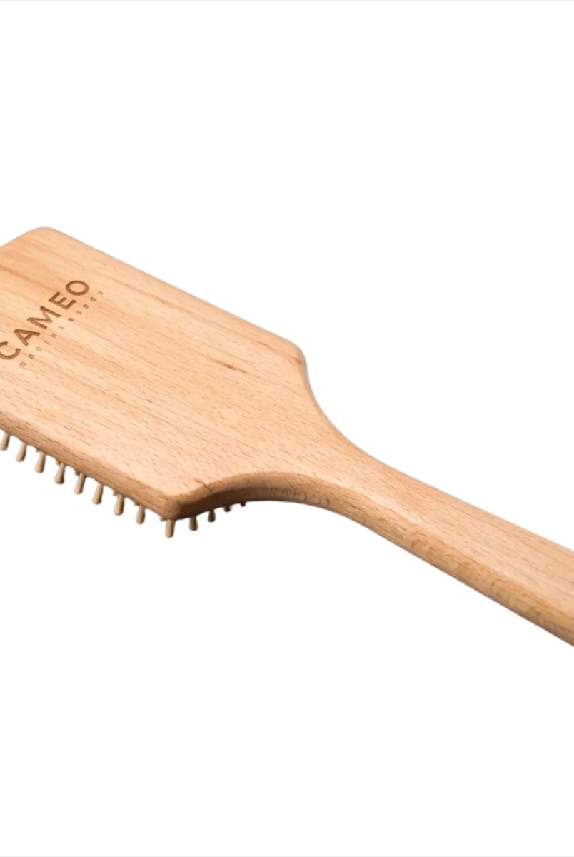 CAMEO The Artisan Mane & Tail Brush in Natural Wood featuring a flat paddle head and ergonomic handle to prevent hair breakage.