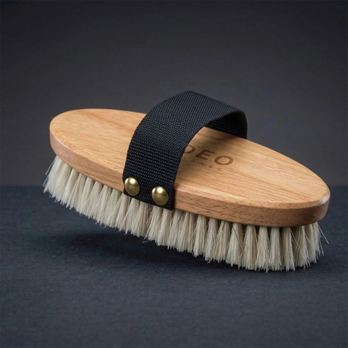 CAMEO The Finishing Touch Body Brush in Maple on a studio background featuring brass-riveted webbing and soft horsehair.