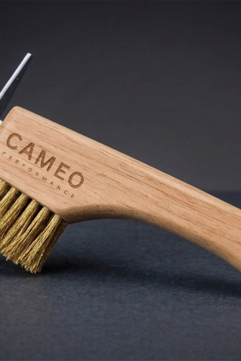 CAMEO The Hoof Hero Elite Edition in Natural Wood on a studio background featuring brass bristles and a solid steel pick.