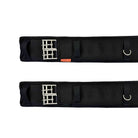 Two black nylon training belts with silver metal buckles and D-rings, displayed horizontally on a white background.