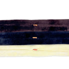 Three fabric swatches in purple, blue, and yellow on a white background