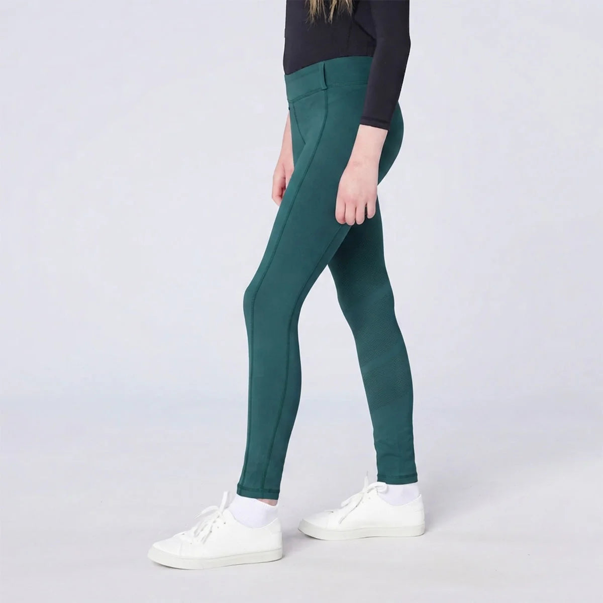 CAMEO All Season Riding Tights in EverGreen featuring a high-rise core-supporting waistband and an innovative full-seat silicone chevron grip for superior in-saddle stability. These technical equestrian leggings include 4-way compression stretch and anti-chafing flat-lock seams for riders.