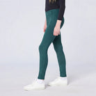 CAMEO All Season Riding Tights in EverGreen featuring a high-rise core-supporting waistband and an innovative full-seat silicone chevron grip for superior in-saddle stability. These technical equestrian leggings include 4-way compression stretch and anti-chafing flat-lock seams for riders.