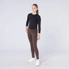 CAMEO All Season Riding Tights in Chocolate Brown worn by a junior rider, featuring a high-rise core-supporting waistband and 4-way compression stretch. These technical equestrian leggings include a thermal brushed lining and full-seat silicone chevron grip for security and comfort in the UK.