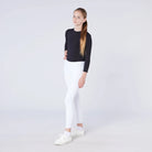 CAMEO All Season Riding Tights in White worn by a junior rider for British competition. These technical equestrian leggings feature a high-rise core-supporting waistband, innovative full-seat chevron silicone grip for in-saddle stability, and a thermal brushed lining for professional show-day comfort.