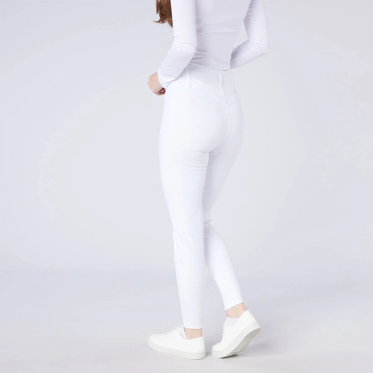 CAMEO All Season Tights in White featuring an innovative full-seat chevron silicone grip for maximum in-saddle stability during competition. These technical equestrian riding tights include a core-supporting high-rise waistband and thermal brushed lining for professional show-day performance in the UK.