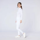 CAMEO All Season Tights in White worn by a rider for British equestrian competition featuring a high-rise core-supporting waistband and 4-way compression stretch. These technical show tights include an innovative full-seat silicone chevron grip and thermal brushed lining for professional performance.