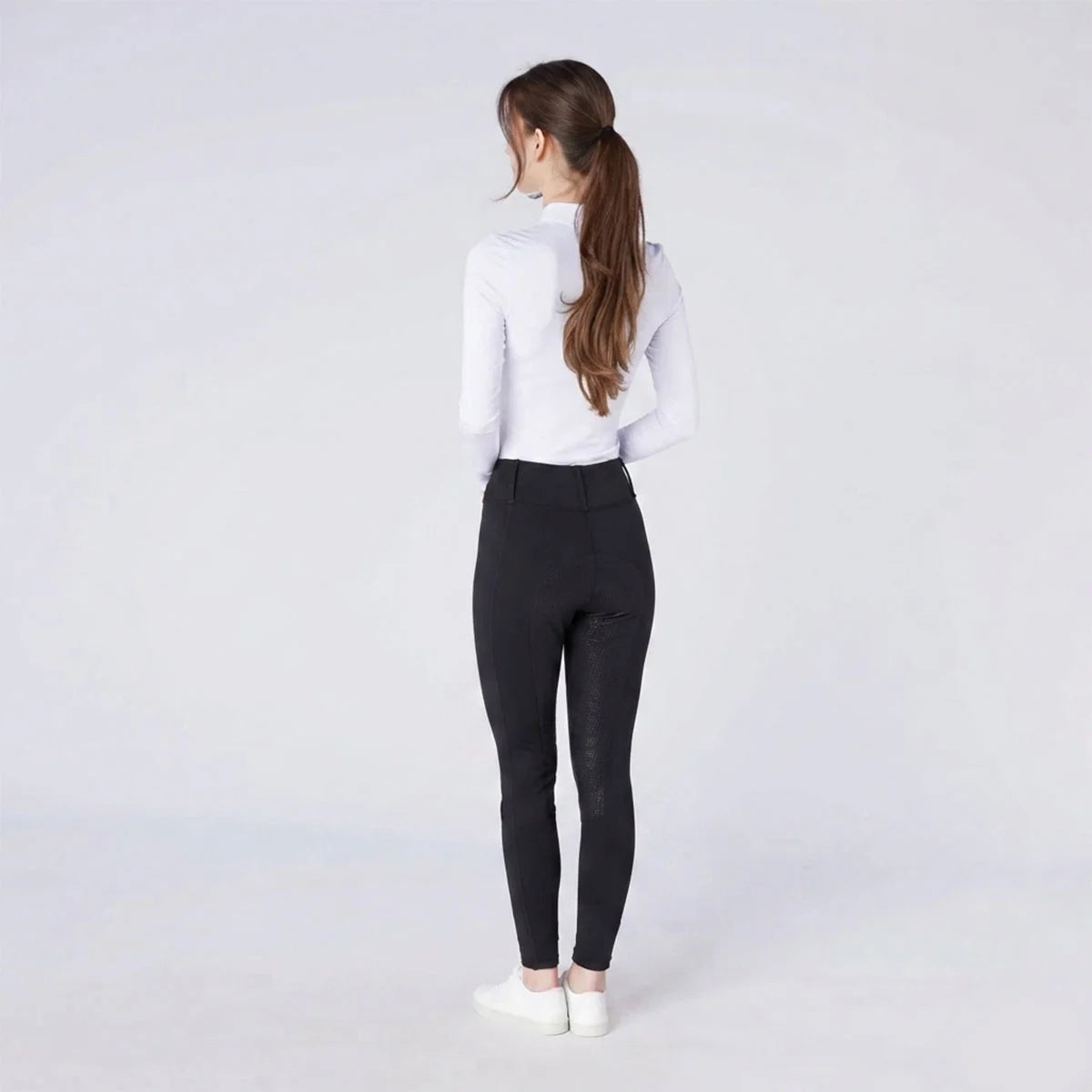 CAMEO All Season Tights in Black featuring an innovative full-seat chevron silicone grip for superior in-saddle stability. These technical equestrian riding tights are designed with a high-rise core-supporting waistband, thermal brushed lining, and ergonomic flat-lock seams for professional UK riders.