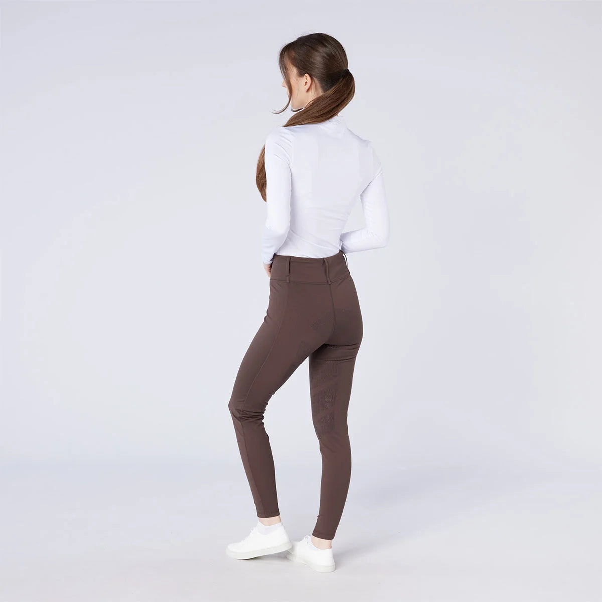 CAMEO All Season Tights in Chocolate Brown featuring a high-rise core-supporting waistband and an innovative full-seat chevron silicone grip for maximum in-saddle stability. These technical equestrian riding tights include a thermal brushed lining and flat-lock seams for professional UK performance.