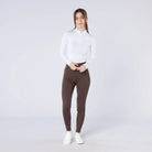 CAMEO All Season Tights in Chocolate Brown worn by a rider featuring a high-rise core-supporting waistband and 4-way compression stretch. These technical equestrian riding tights include an innovative full-seat silicone chevron grip and thermal brushed lining for all-weather training in the UK.