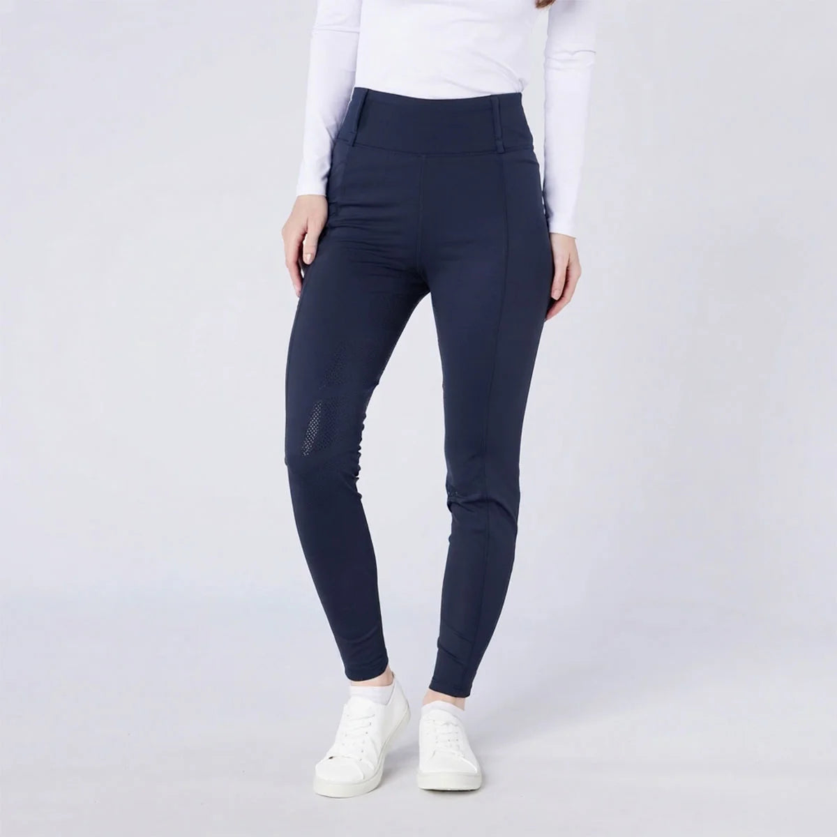 CAMEO All Season Tights in Navy featuring a high-rise core-supporting waistband and a full-seat chevron silicone grip for superior in-saddle stability. These technical equestrian riding tights include ergonomic flat-lock seams and thermal brushed lining for all-weather performance in the UK.