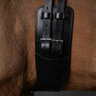 Close up of a CAMEO Kinetic Dressage girth with cast stainless steel buckle on a dark bay colour horse