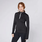 CAMEO Core Collection Baselayer in Black featuring a contrast white quarter-zip and technical 4-way stretch CameoTech fabric. This professional equestrian top is designed with a tailored silhouette, ergonomic flat-lock seams, and active moisture-wicking properties for high-performance riding in the UK.
