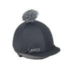 CAMEO Core Hat Silk in Black featuring a grey faux-fur pom-pom and high-performance CameoTech 4-way stretch fabric. This professional equestrian helmet cover offers a wrinkle-free fit over jockey skulls, complete with a flexible peak and secure elastic hem for schooling or competition in the UK.