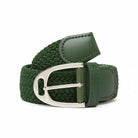 CAMEO Core Woven Stretch Belt in Green showcasing a rolled elastic braided webbing body, tonal leather chapes, and a chrome stirrup buckle engineered for infinite micro-adjustability and non-restrictive stretch comfort over riding breeches.