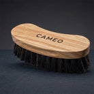 CAMEO Deep Clean Dandy Brush in Maple on a studio background featuring natural horsehair bristles to lift deep coat dust.