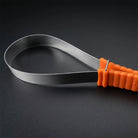 CAMEO Dual-Action Shedding Blade in Orange on a studio background featuring double-sided serrated teeth for horse coat moulting.