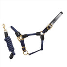 CAMEO Rope Leather Headcollar and Leadrope in Navy showcasing braided yachting rope, black leather poll strap, and solid brass fittings, complete with a matching coiled leadrope and trigger clip for sensitive groundwork control and stableyard travel.