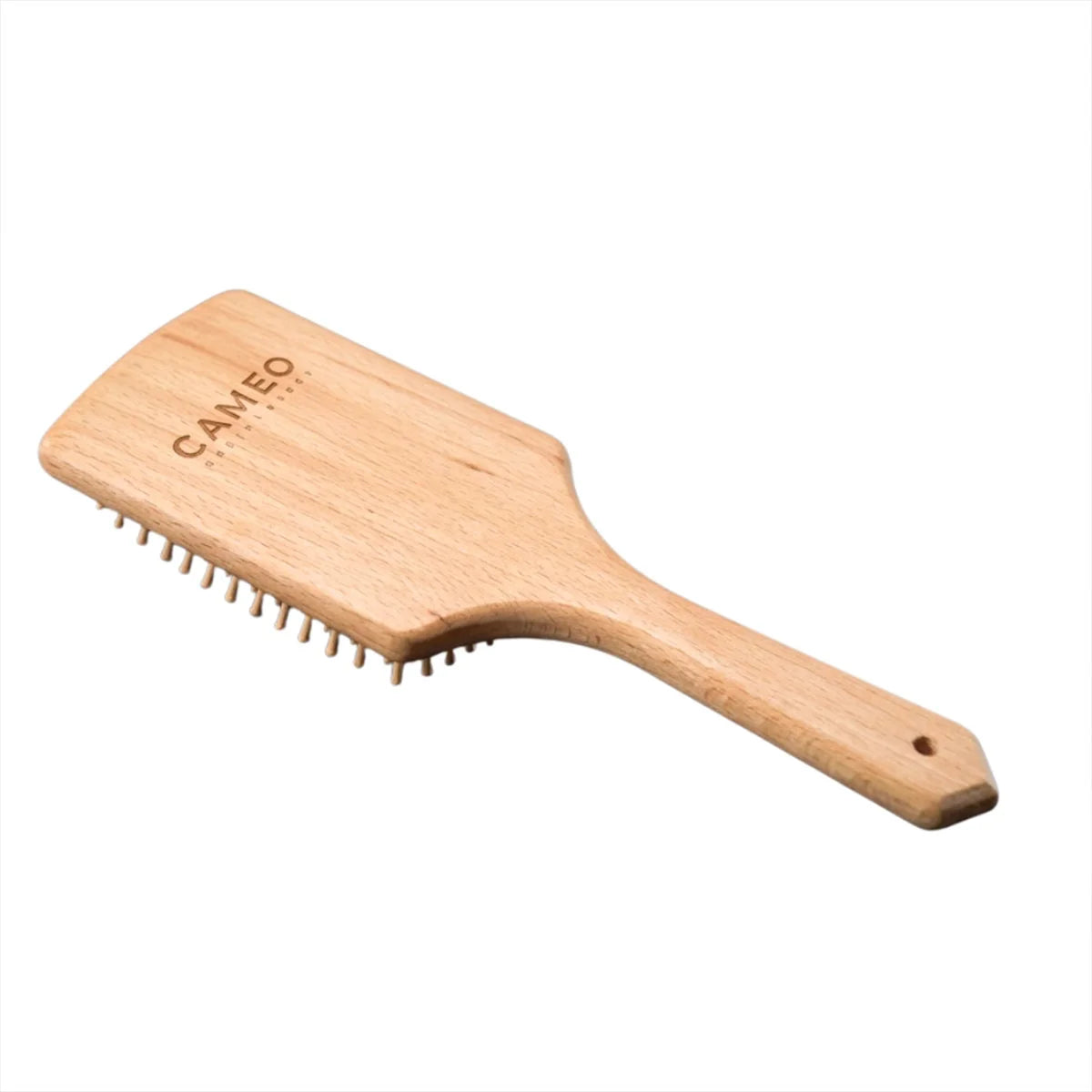 CAMEO The Artisan Mane & Tail Brush in Natural Wood featuring a flat paddle head and ergonomic handle to prevent hair breakage.