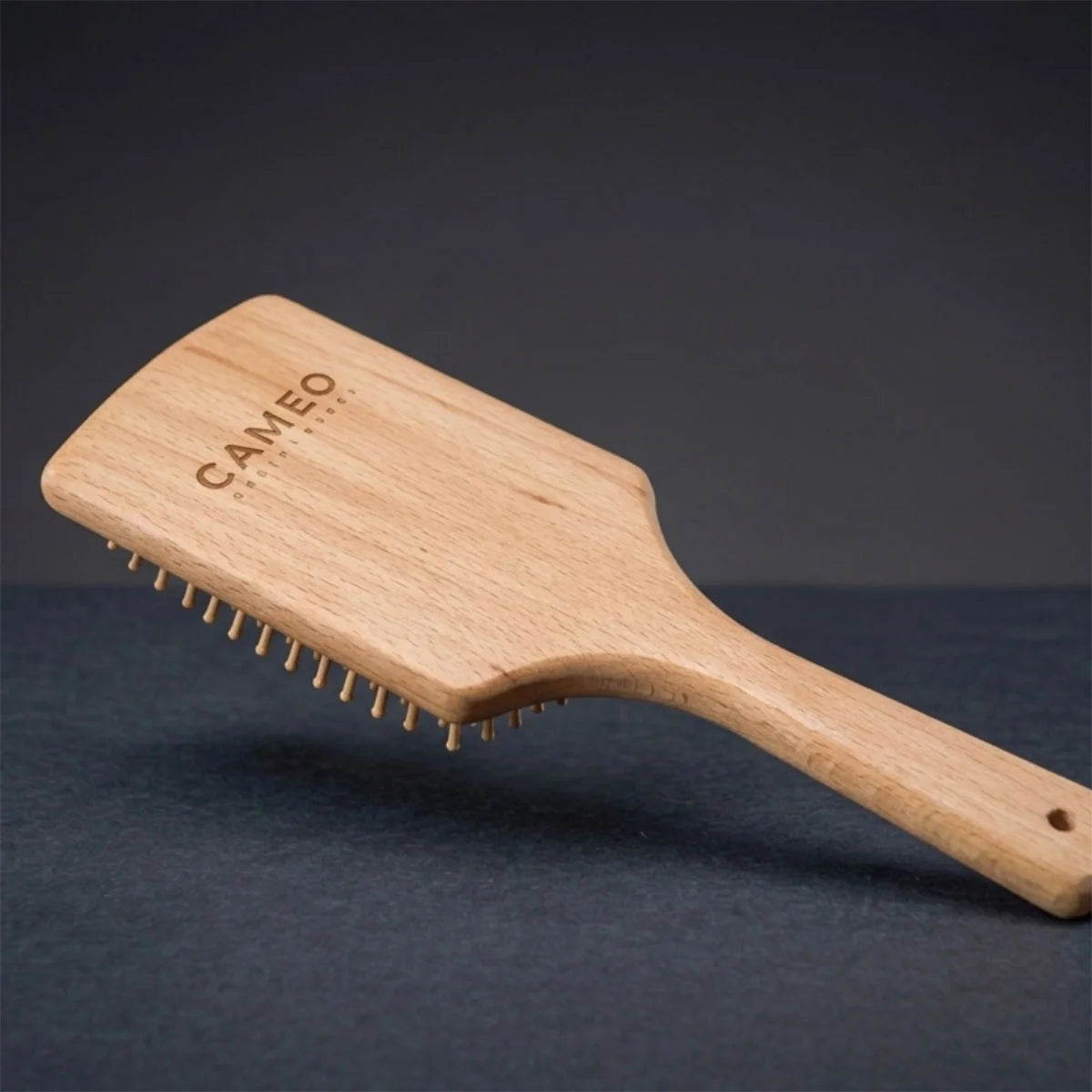 CAMEO The Artisan Mane & Tail Brush in Natural Wood on a studio background with smooth wooden pins for gentle detangling.